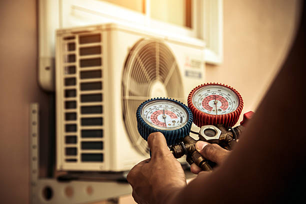 Professional Heat Pump Repair technician working in Grabill, IN